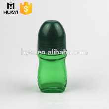 Envase del desodorante del vidrio verde 30ml con la bola del rodillo